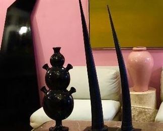 This home is chock full of 70’s and 80’s goodness. This grey marble coffee table is a dream. Large abstract painting / artist is Luc Leestaker . Large Sculptural Geometric Piece -custom designed , hangs on the wall. Stunning pieces 