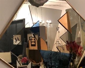 1970’s mirror with geometric colorful mirror shapes attached. Extremely unique! 