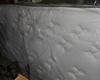 1 twin mattress still in plastic