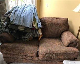 Loveseat and clothing 