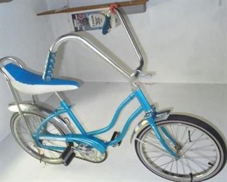 Girl's Renegade aqua color bike w/banana seat