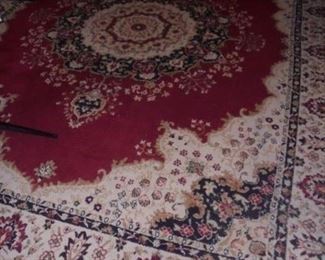 Red rug in living room