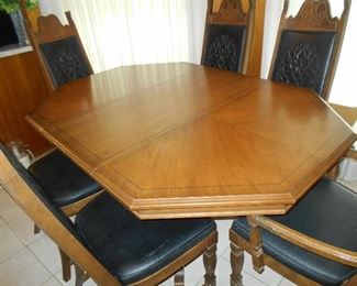 Dining table with stitched pattern chairs and 1 extra leaf with all pads..GREAT VINTAGE FIND
