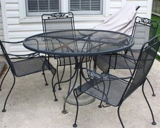 Wrought iron table and 4 chairs