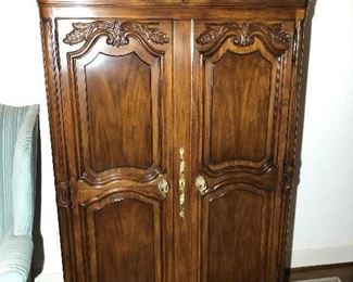 Statton carved wardrobe/armoire