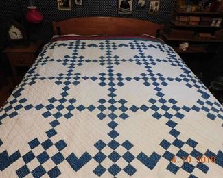 Over 25 old quilts.