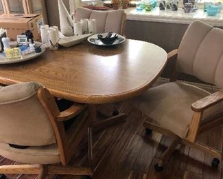 Large table with 2 leaves that has 4 chairs - the metlox is sold