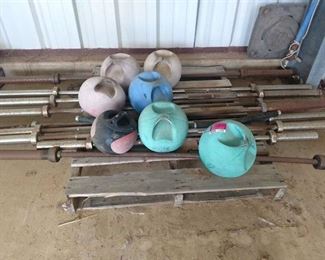 Lot Of Exercise Balls And Barbells