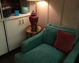 Club chair, table with built in lamp, Asian decor pieces