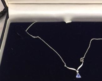 Very small Tanzanite and diamond necklace $50