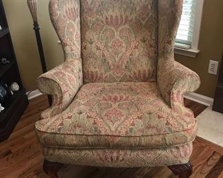 expensively upholstered wingback chair