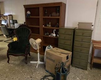 Bookshelves, antique chair, humidifier in box