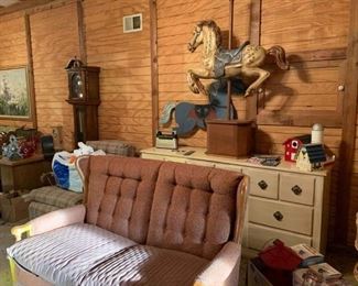 Dresser, carousel horse, love seat. Grandfathers clock and more