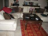 Super white leather sectional.