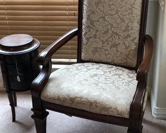 remarkable antique-look chair and round ornate side table