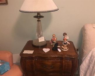 White Fine Furniture 2-drawer bedside table with Goebel Hummel figurines