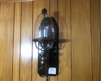 Brass and wood wall sconce