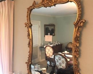 Ornate gilt framed mirror