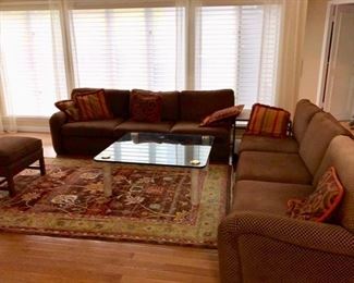 Living room sofas, rug & coffee table