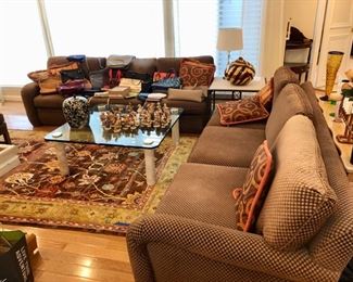 Living room sectional sofa, like new, area rug & glass coffee table 