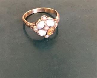 14 kt. gold ring with 2 diamonds and opals.