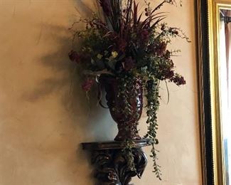 Sconce and dried flower arrangement