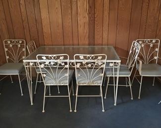 Wrought Iron Glass Top Table with 6 Chairs - Located in the Basement/Patio
• 54"x32"