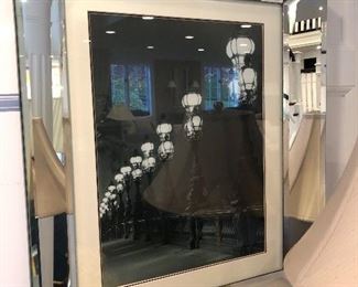 Many beautiful framed black and white photographs.