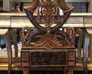 CURREY & COMPANY | The Nefret Chair evokes a look of drama and intensity, striking quite a pose with detailed carvings in Distressed Black and Gold Leaf finishing. Carved in the Empire Revival style