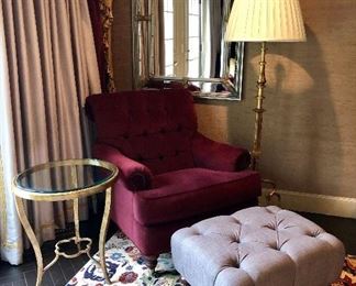 Tufted ottoman, brushed gold, glass top side table and gorgeous mirrors!