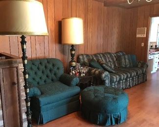 Beautiful deep green sofa, chair and ottoman.  There is also a matching love seat. The ottoman was hardly used and the throw pillows are brand new. The set is great condition and pairs well with the mid century metal green lamps from Japan.  There is matching tabletop lamp.  