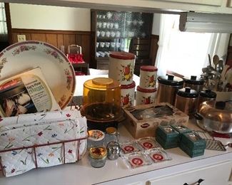 Assorted kitchen items - Mirro cookie press, Revere copper utensil hooks (New), Rubbermaid carrousel (New)