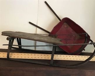 Antique child’s sled and wheelbarrow 