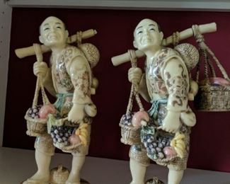 Oxbone netsuke carved man carrying fruit