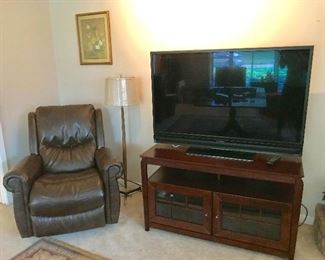 Flatscreen tv, tv cabinet, recliner