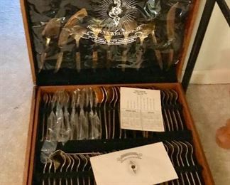 Bronze flatware in case