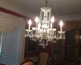 Beautiful crystal chandelier...must be taken down by the buyer