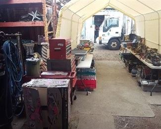 tent full of tools also air compressor , tile saw, craftsman tool box etc.
