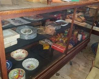Several antique display cases and several vintage display cases also for sale