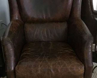 Chic “weathered” brown leather arm chair