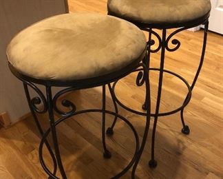 Upholstered bar-height stools.