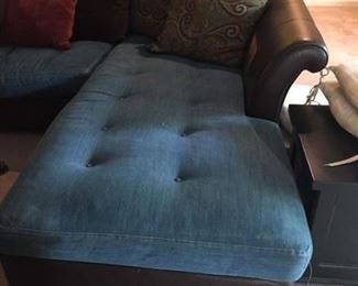 detail of denim and leather sectional