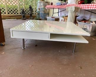 #89	H Table	Mid Century White Square coffee table on Metal legs  with storage shelves 	 $200.00 

