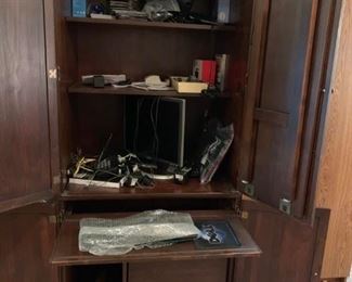 #4	wood desk armoire w pull out desk shelf  4 doors33x24x76	 $100.00 
