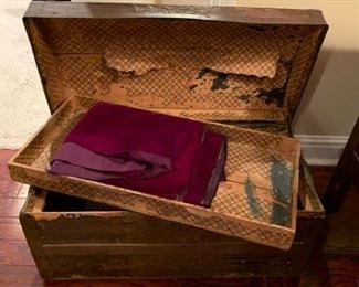 #25	small antique camel back trunk with tray 	 $75.00 
