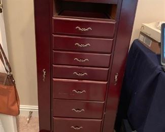 #26	tall jewelry cabinet with side storage and 8 drawers 18x15x40	 $125.00 
NOTE It does have the top drawer..