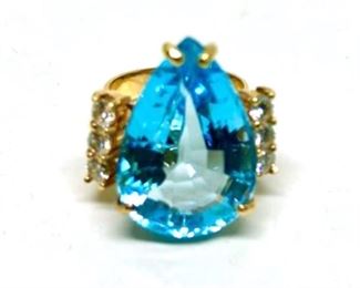 Lot 001 
Teardrop Blue Topaz and Diamond 14k Ring