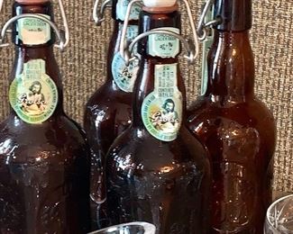 Four vintage beer bottles