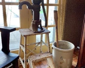 Vintage step stool and cast iron water pump