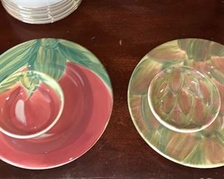 Set of four vegetable plates with matching bowl